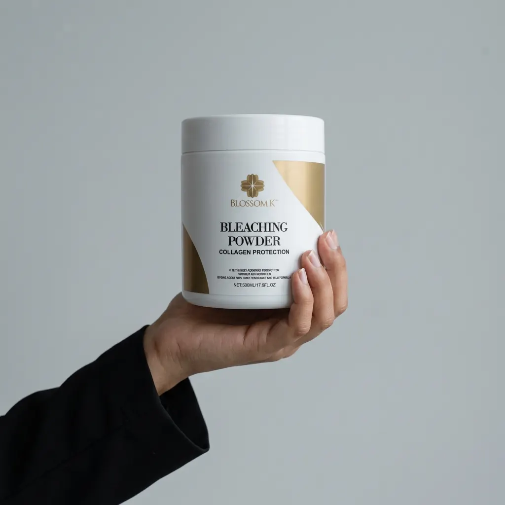 Hand holding BlossomK Professional Bleaching Powder 50g — Static Dust Technology — Made in Italy against a cool grey background